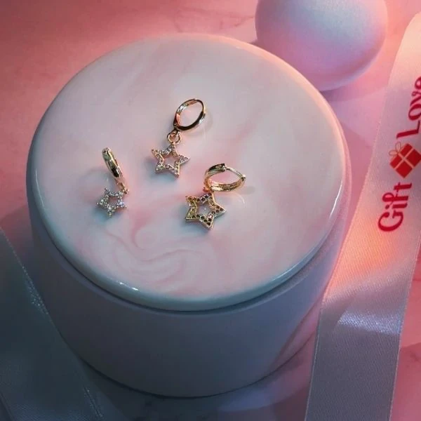 Three Small Hoop Earrings with Star Charms